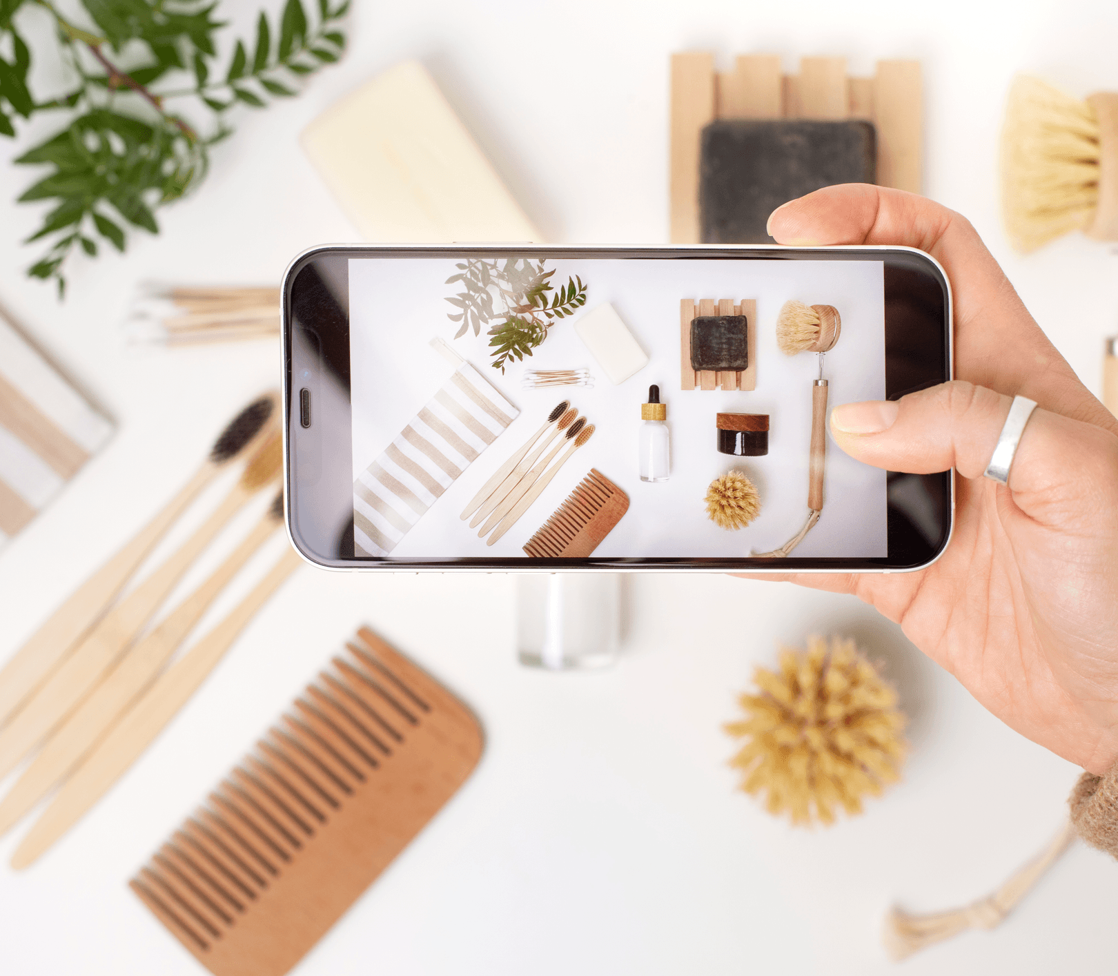 Social media content calendar and creative assets on desk